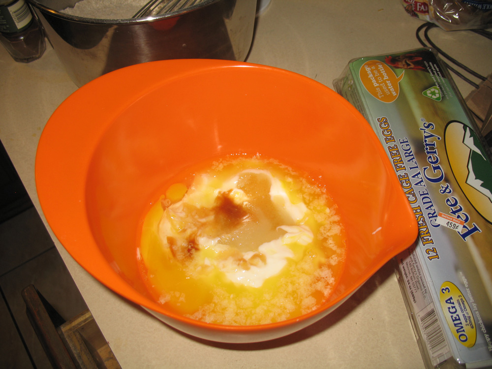 wet ingredients in orange bowl