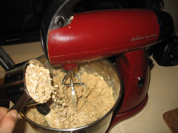 adding oats in mixer
