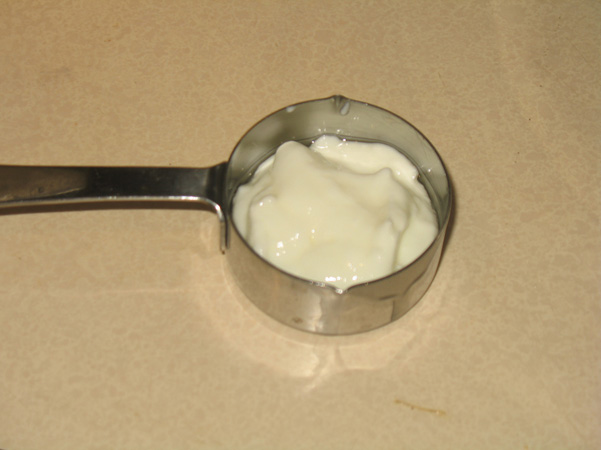 yogurt in measuring cup