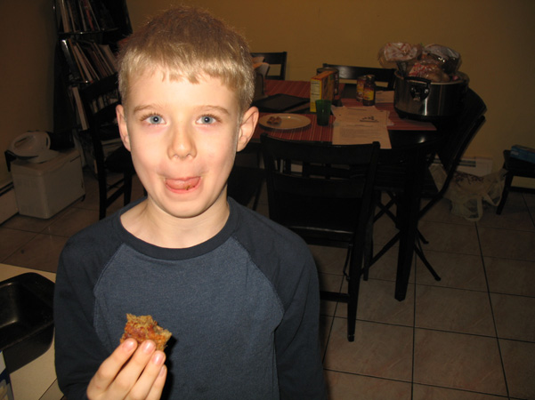 Nathaniel eating cinnamon swirl banana bread