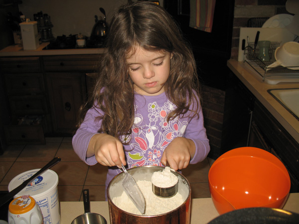 Juliet measuring flour