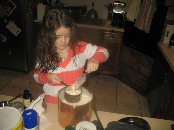 Juliet measuring flour