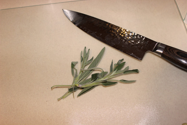 sage with knife