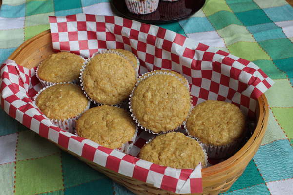 orange oat muffins in basket