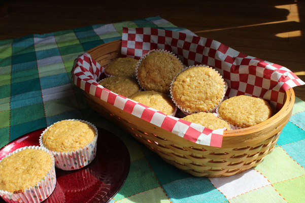orange oat muffins in basket