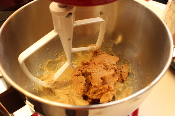 mixing in peanut butter and vanilla