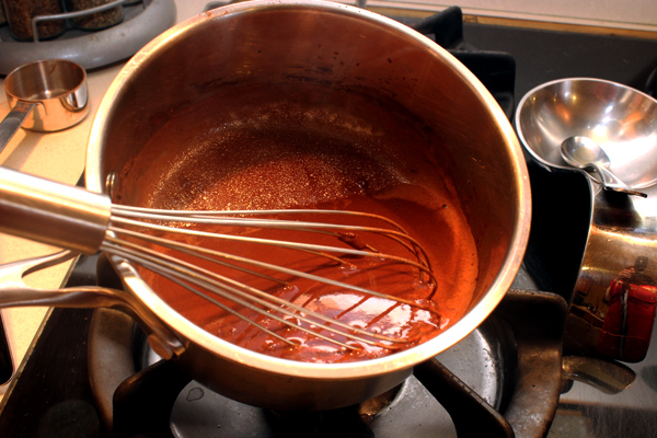 whisking in cocoa powder