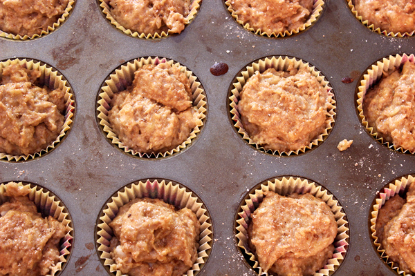 whole wheat banana muffins batter in tins