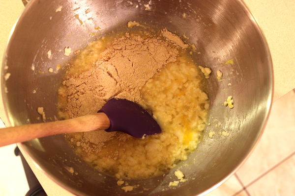 adding flour to lumpy batter